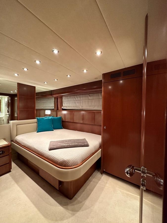 a bed in a room aboard VIDA LOCA Yacht for Sale