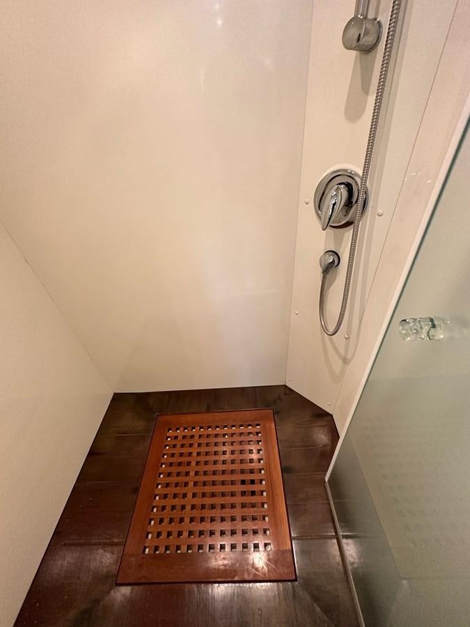 a metal door with a metal handle aboard VIDA LOCA Yacht for Sale