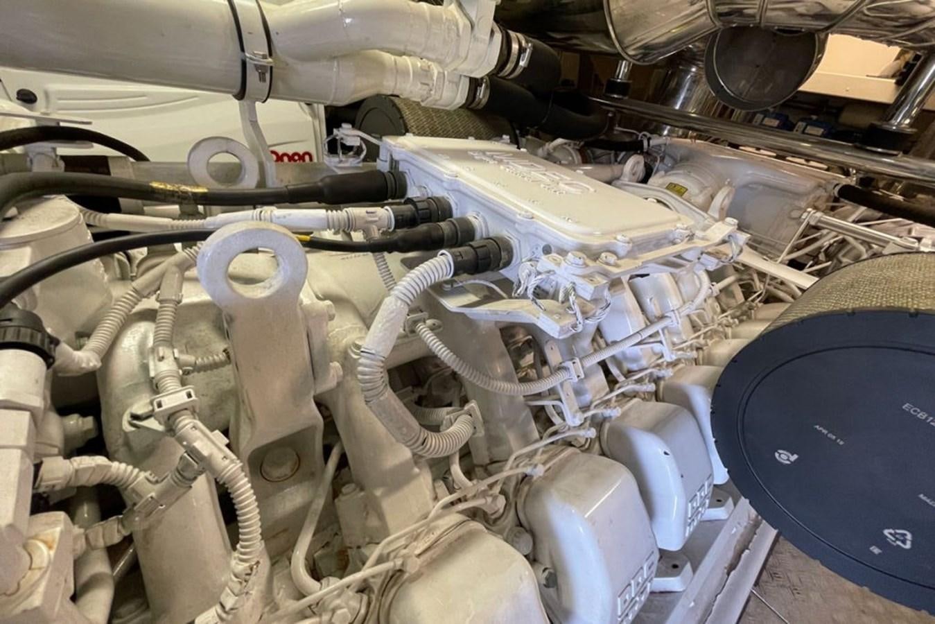 a car engine with pipes aboard VIDA LOCA Yacht for Sale