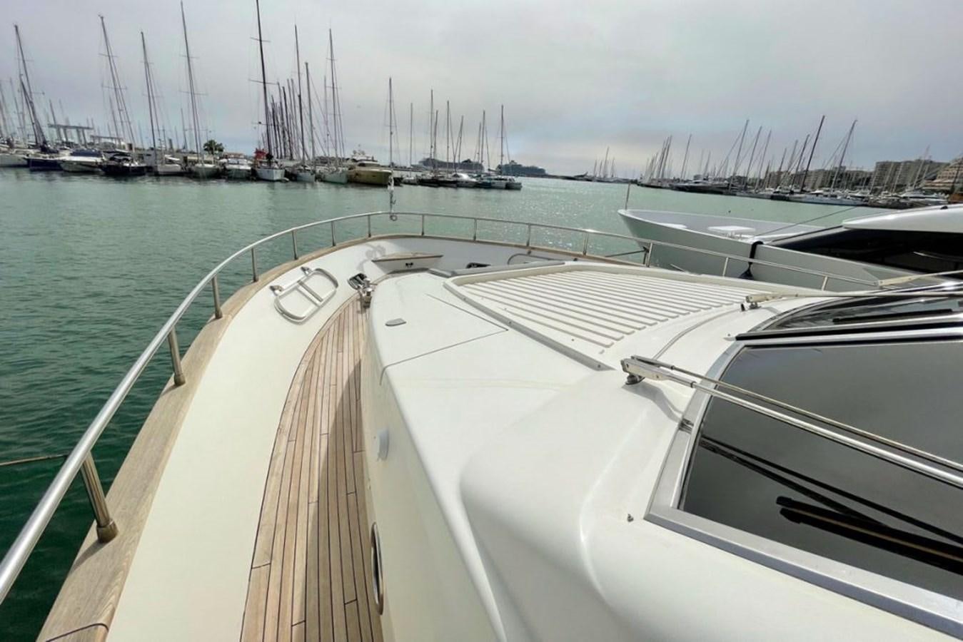 a boat is parked in the water aboard VIDA LOCA Yacht for Sale
