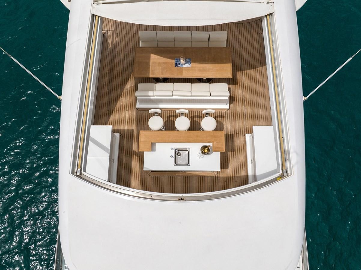 a window with a wood frame aboard FREEDAY Yacht for Sale