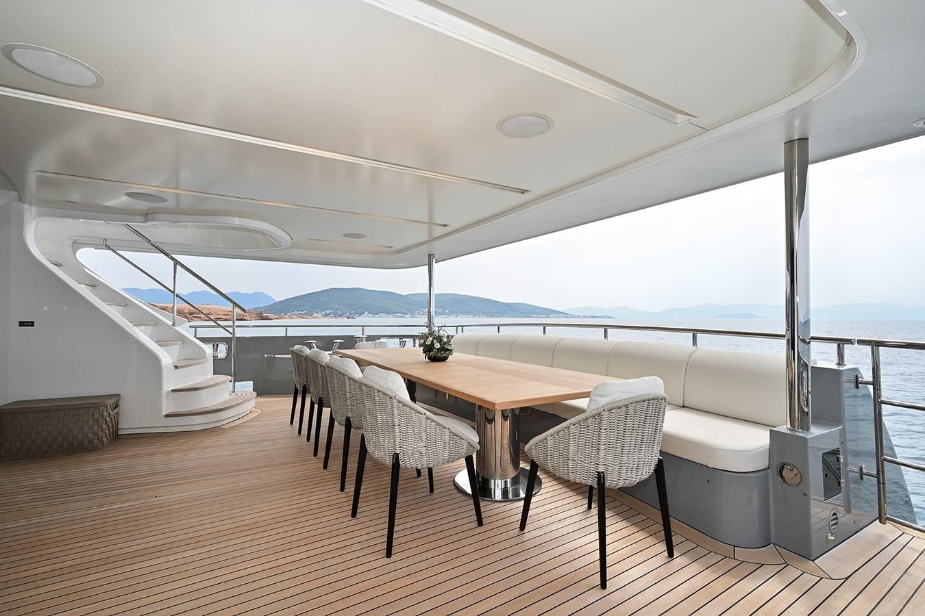 a table and chairs on a boat aboard FREEDAY Yacht for Sale