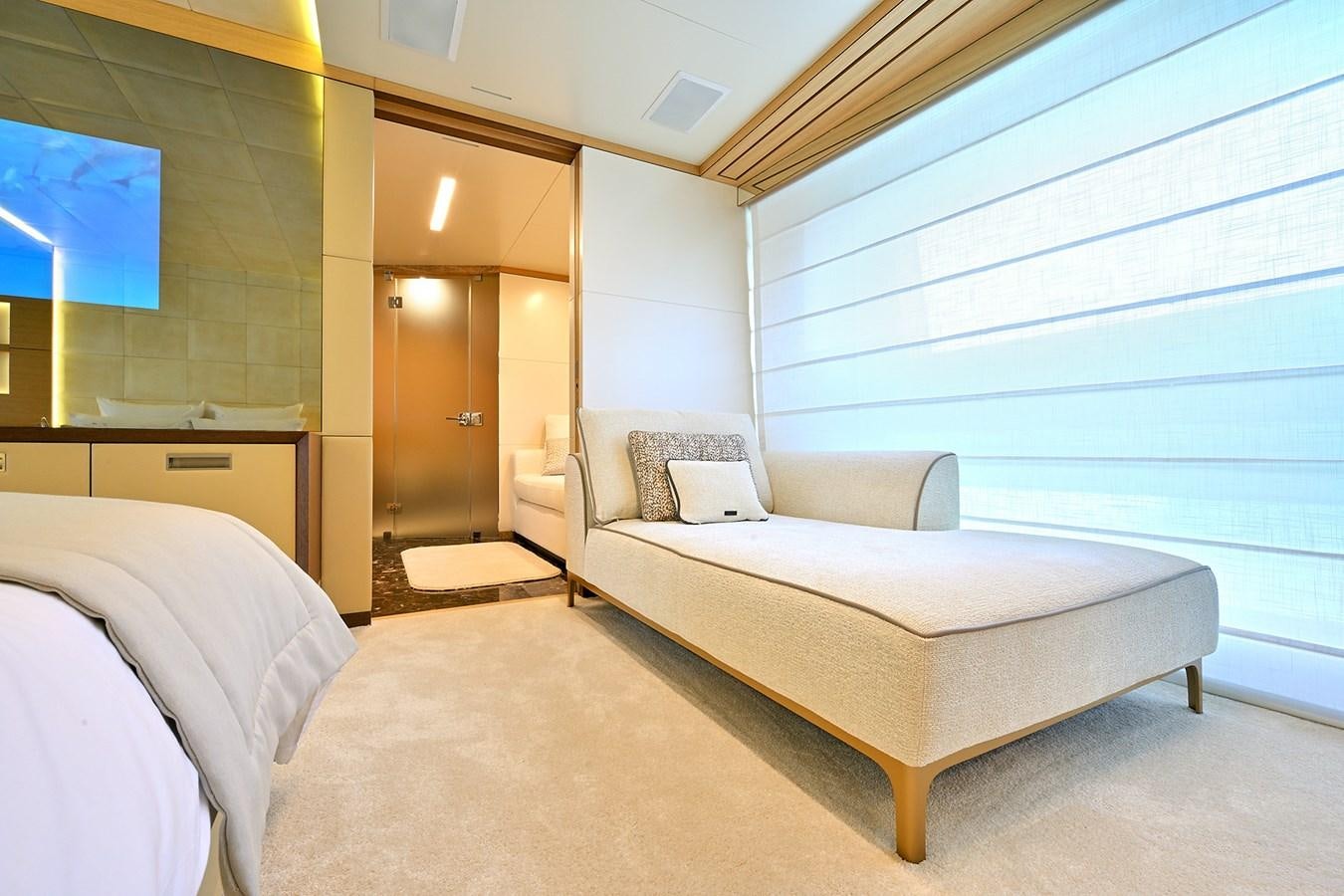 a room with a bed and a couch aboard FREEDAY Yacht for Sale