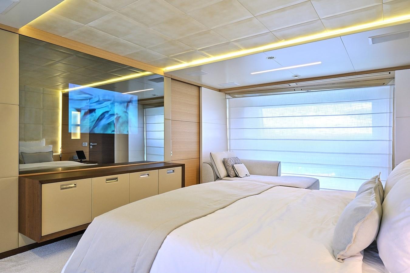 a room with a bed and a window aboard FREEDAY Yacht for Sale