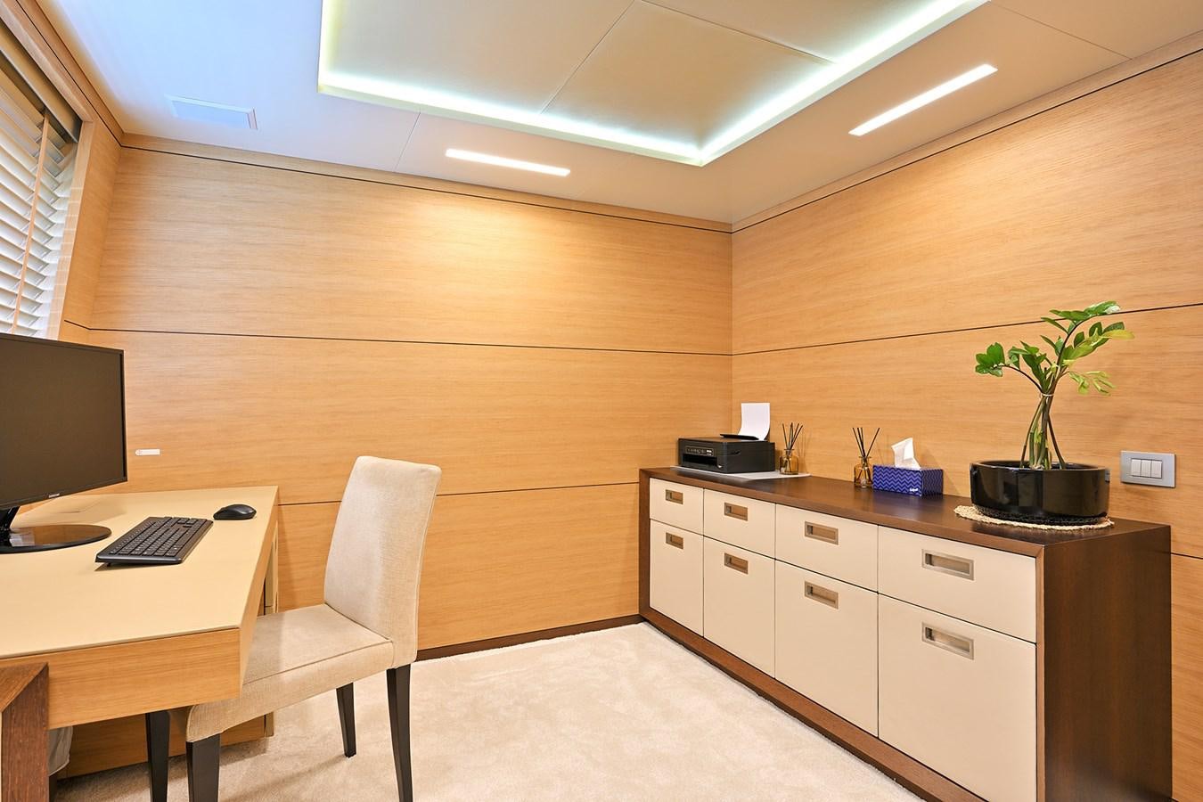 a room with a desk and a computer aboard FREEDAY Yacht for Sale