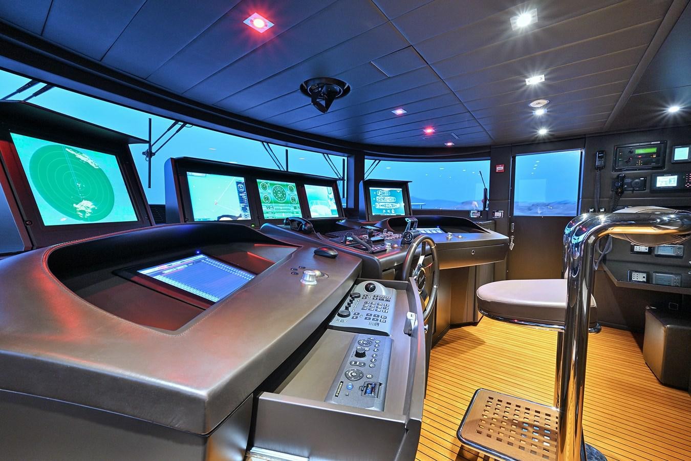 a control room with many monitors aboard FREEDAY Yacht for Sale
