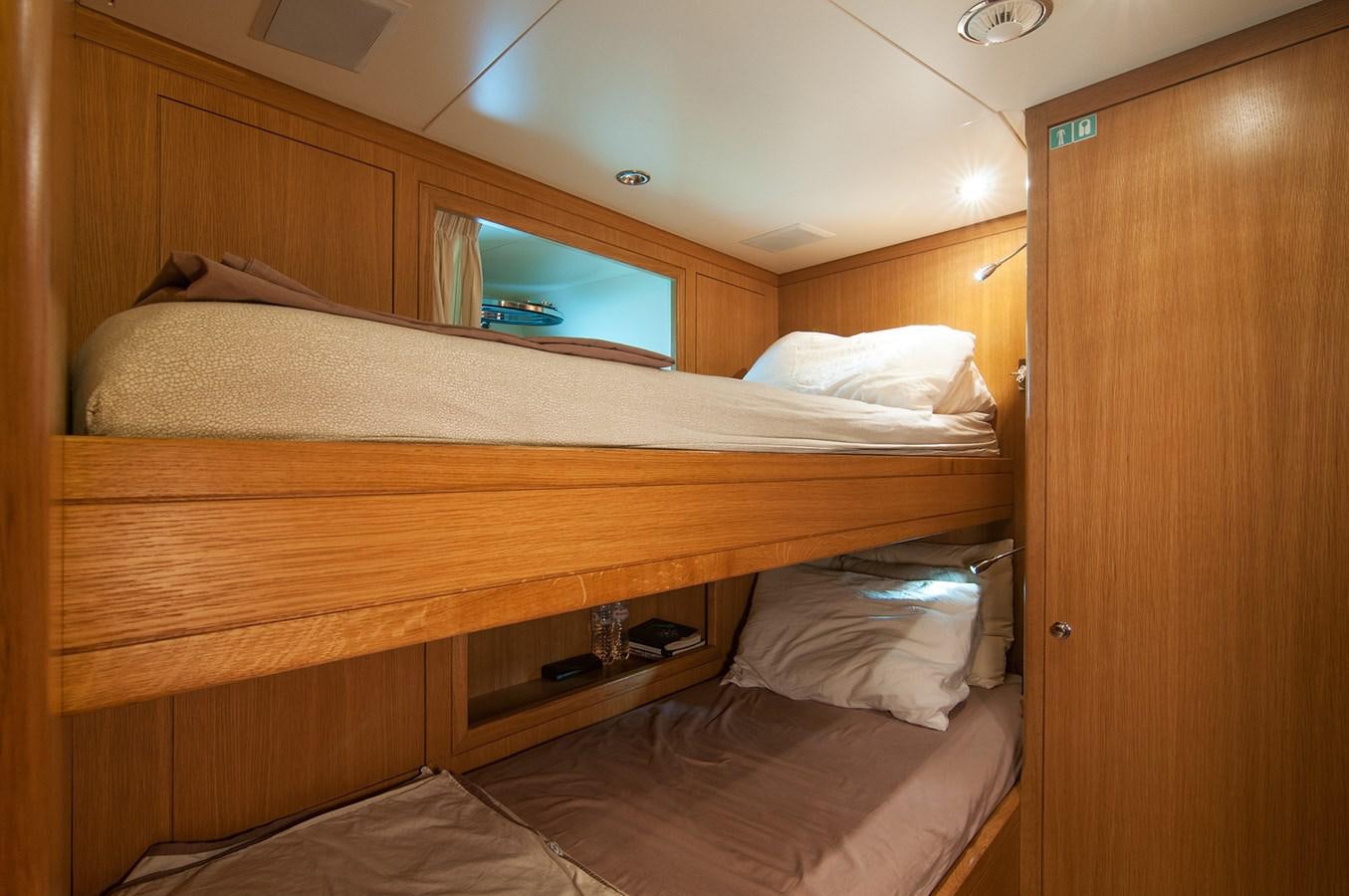 a room with two beds aboard FREEDAY Yacht for Sale