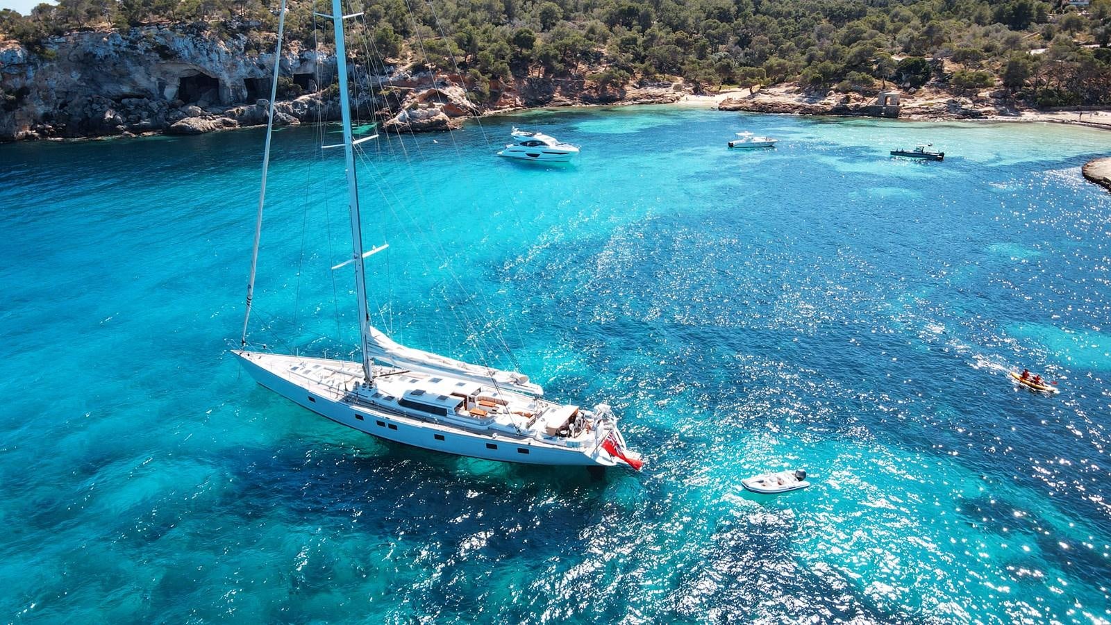 a boat sailing on the sea aboard YQUEM Yacht for Sale