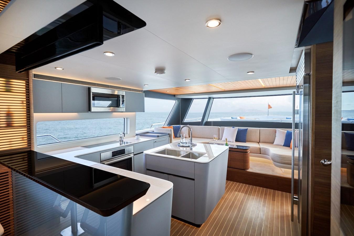 a modern kitchen with a large window aboard CLX96/01 Yacht for Sale