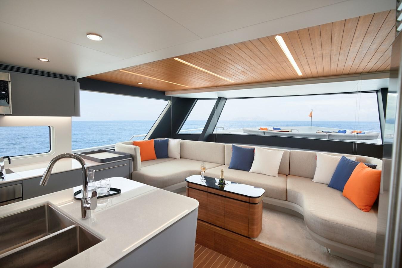 a living room with a large window aboard CLX96/01 Yacht for Sale