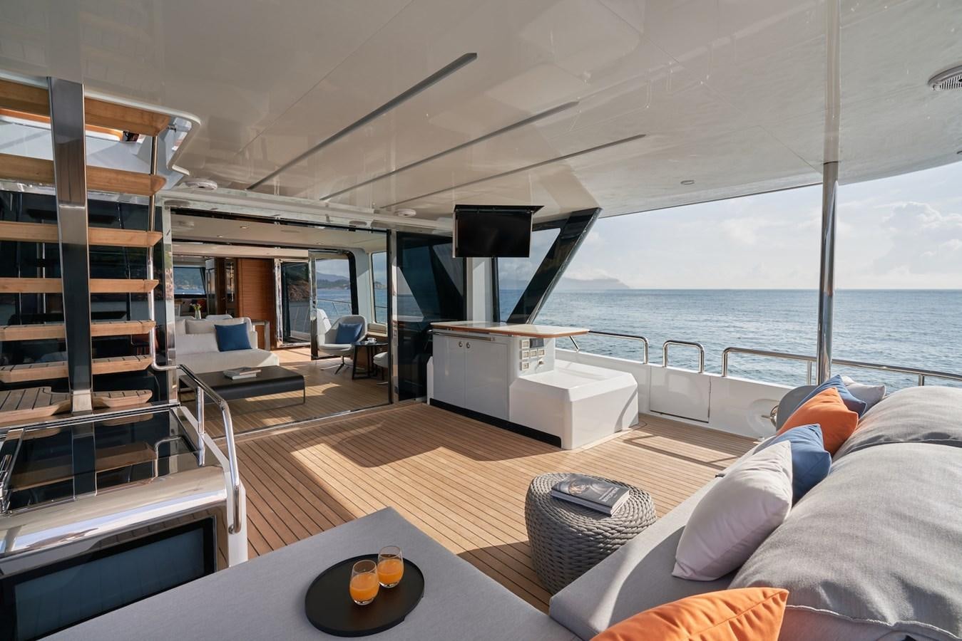 a boat with a table and chairs aboard CLX96/01 Yacht for Sale