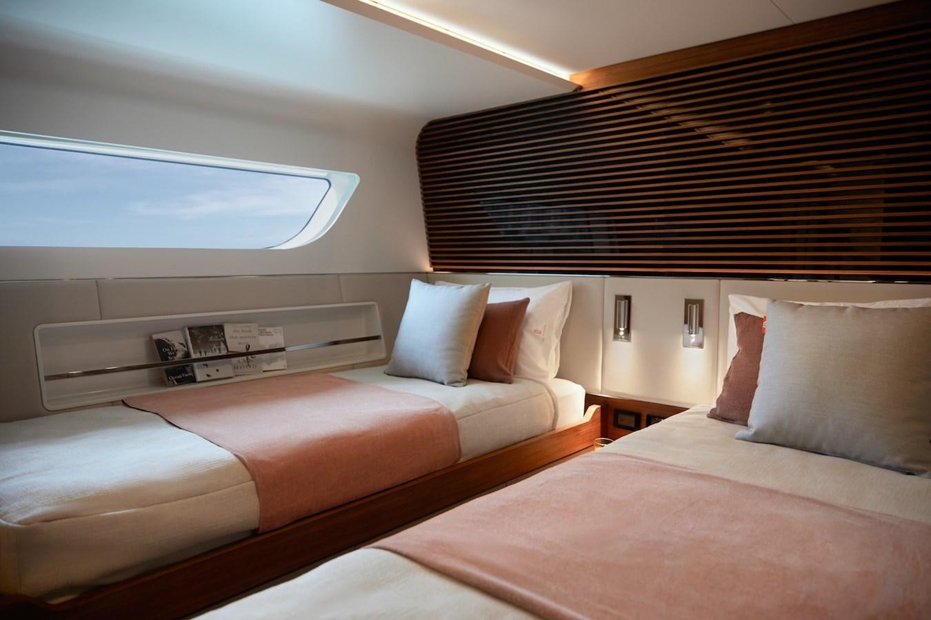 a room with two beds aboard CLX96/01 Yacht for Sale