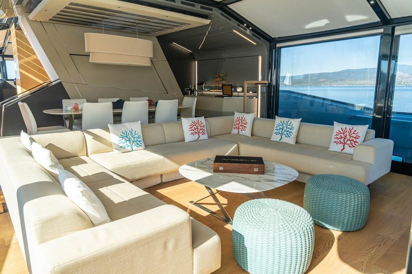 a living room with a large window aboard ANGELS Yacht for Sale