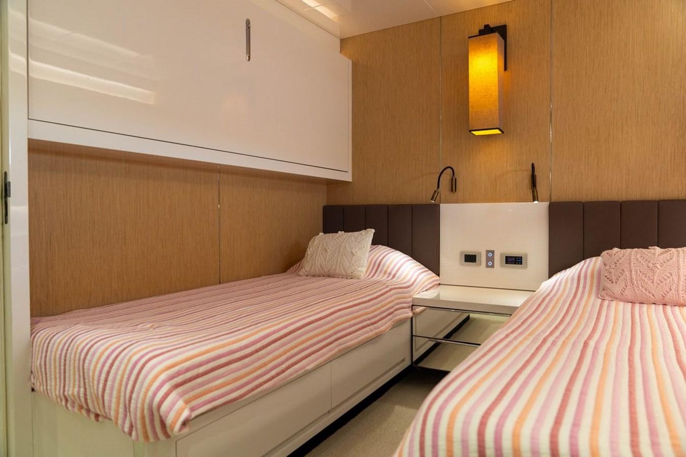 a couple of beds in a room aboard ANGELS Yacht for Sale