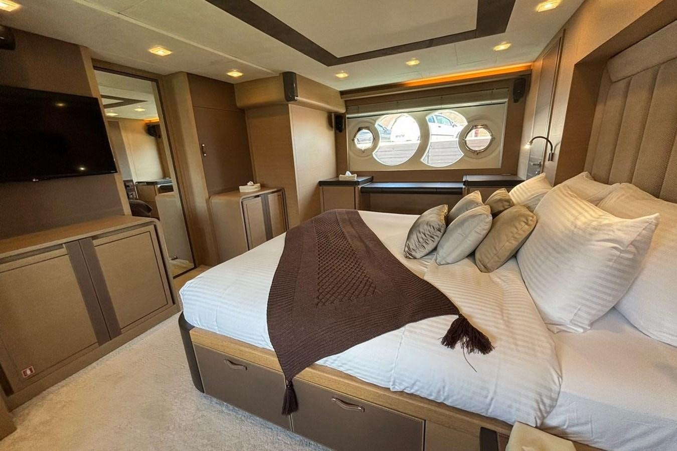 a bed in a room aboard NAYLA Yacht for Sale