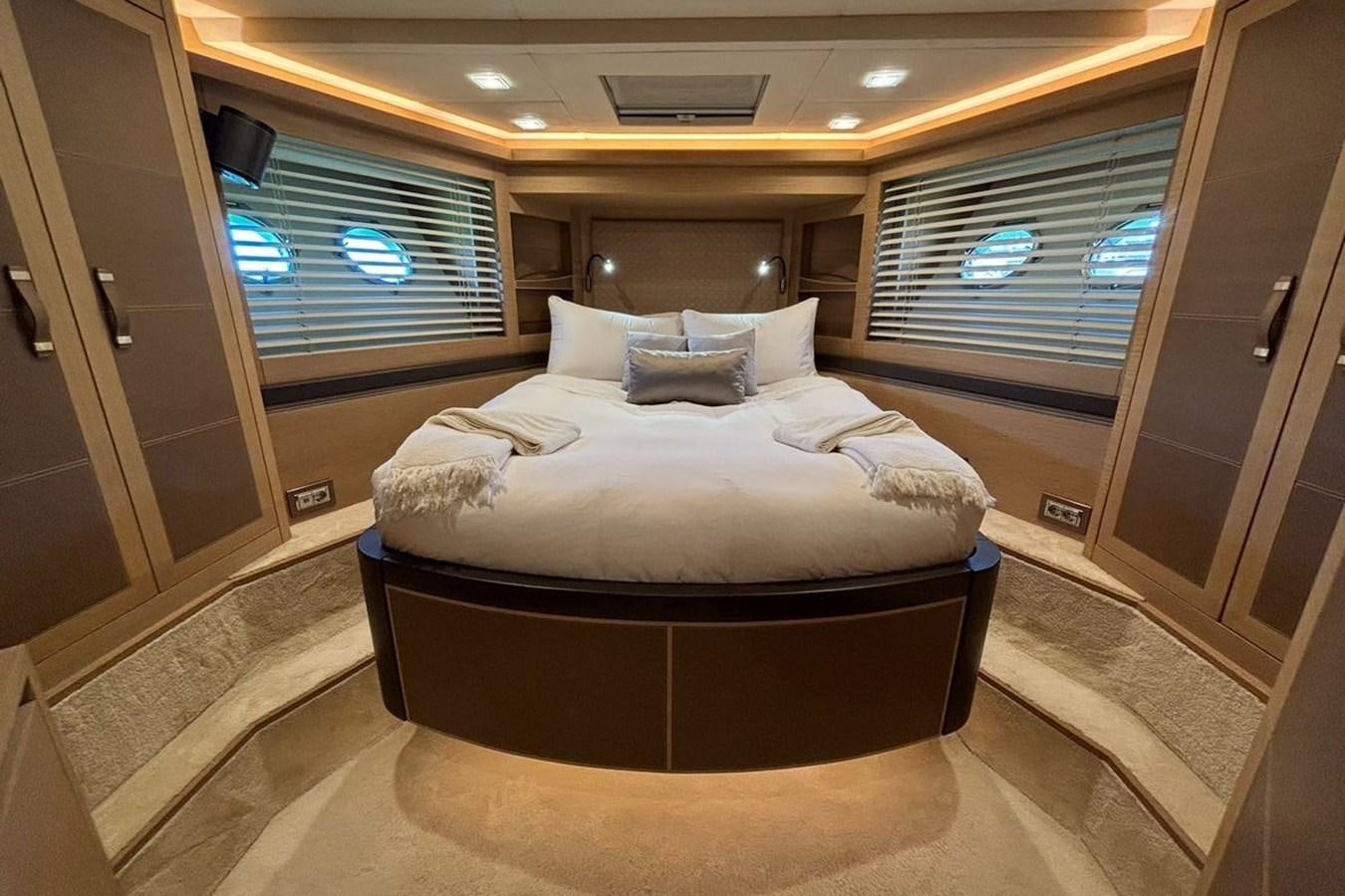 a bed in a room aboard NAYLA Yacht for Sale
