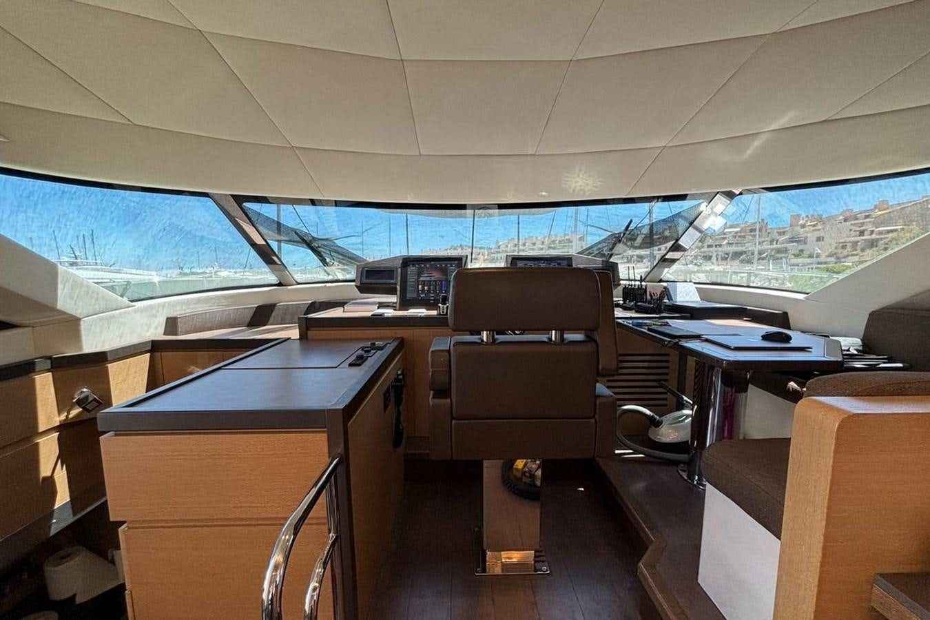 an office with a large window aboard NAYLA Yacht for Sale