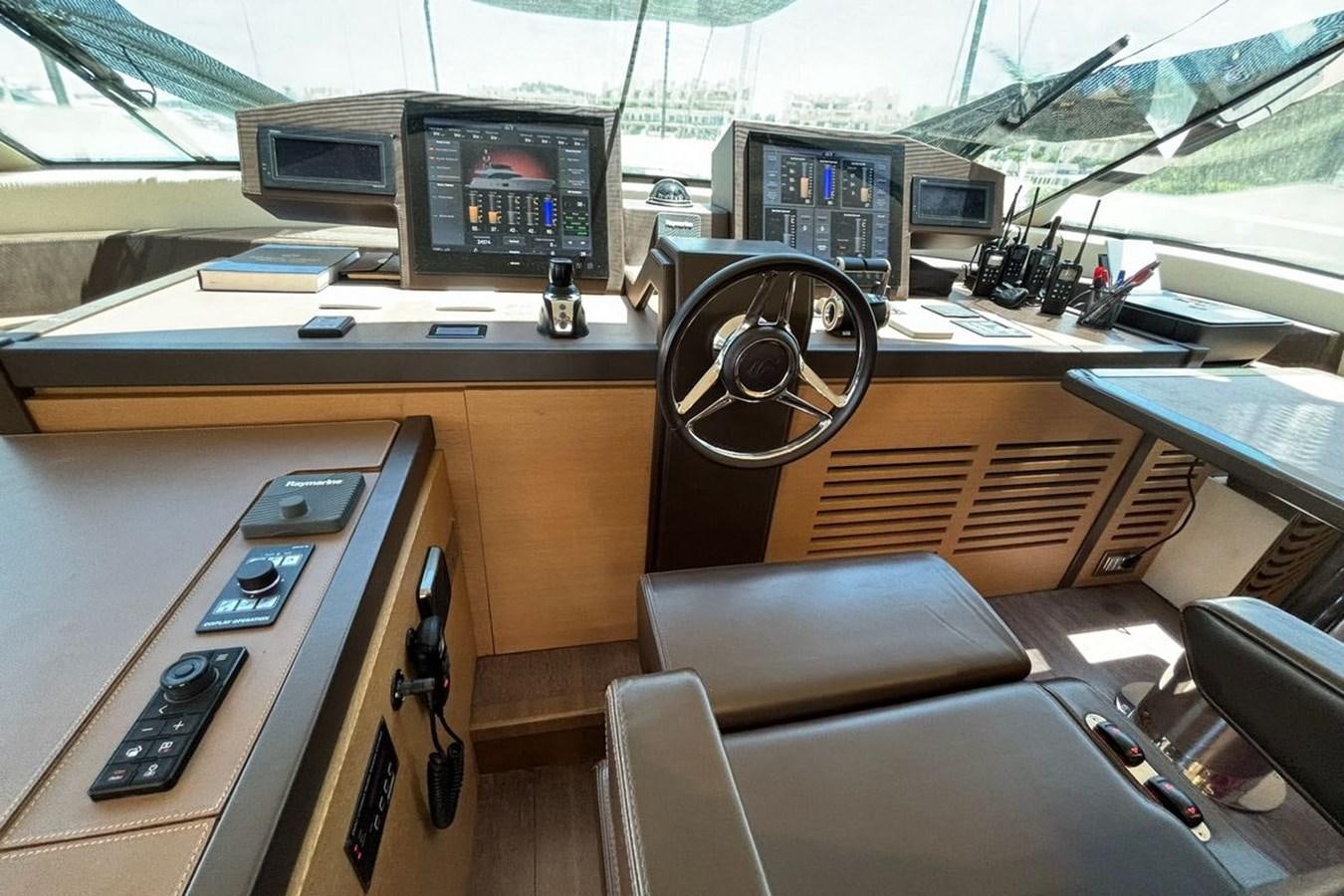 a room with a desk and computer aboard NAYLA Yacht for Sale