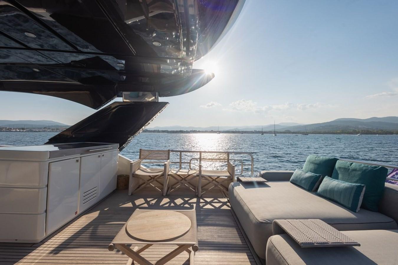 a boat on a deck aboard NAYLA Yacht for Sale