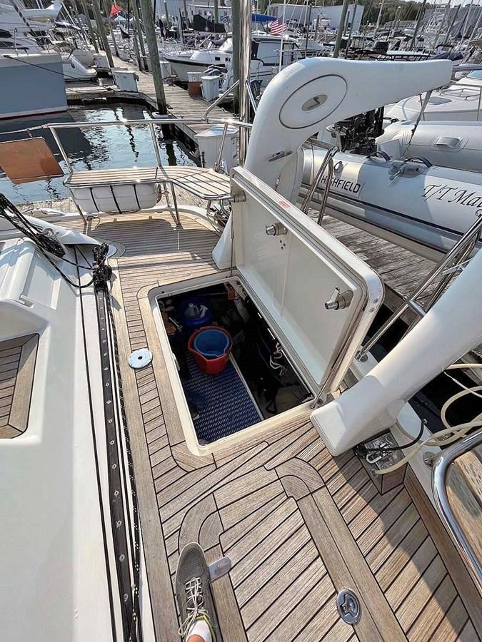 a large white machine with a red cup on the rim aboard MATAWAI Yacht for Sale