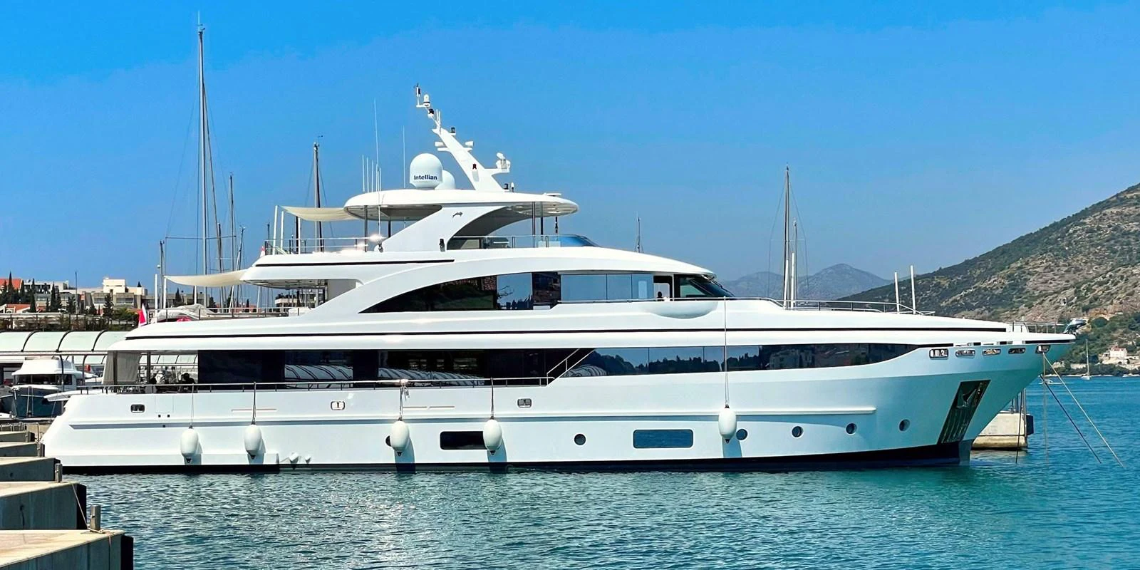 a white yacht on the water aboard DOMENIKA Yacht for Sale