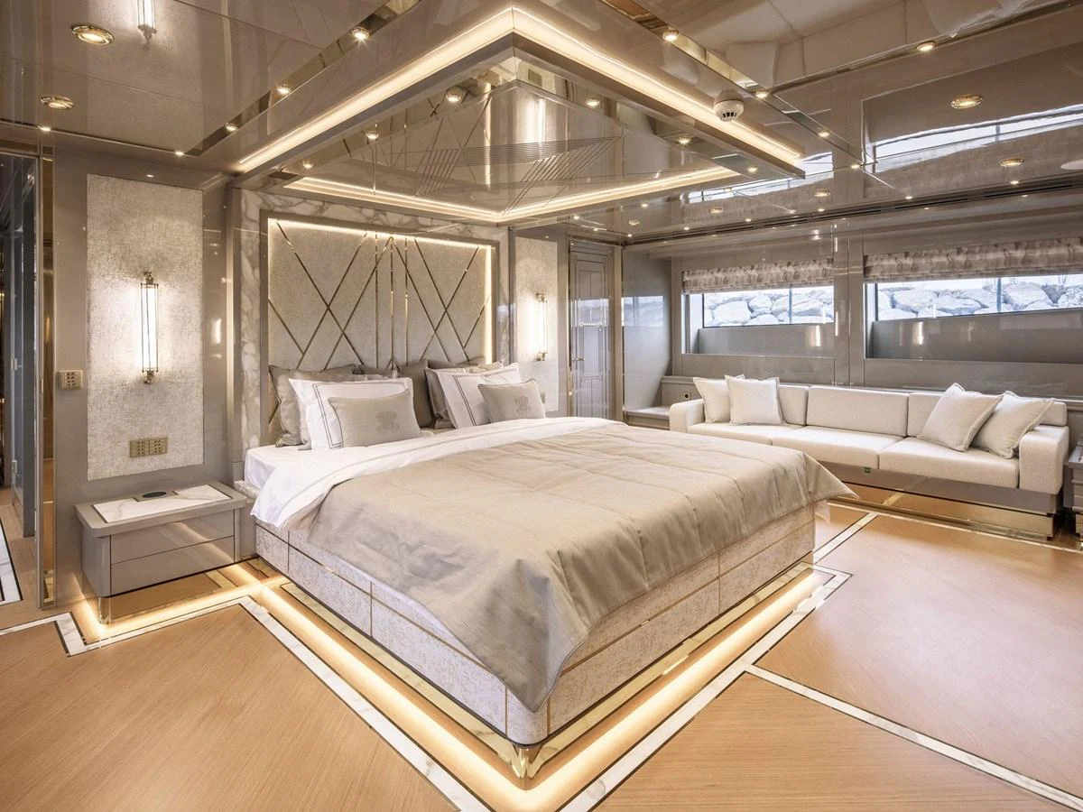 a large bed in a room aboard DOMENIKA Yacht for Sale