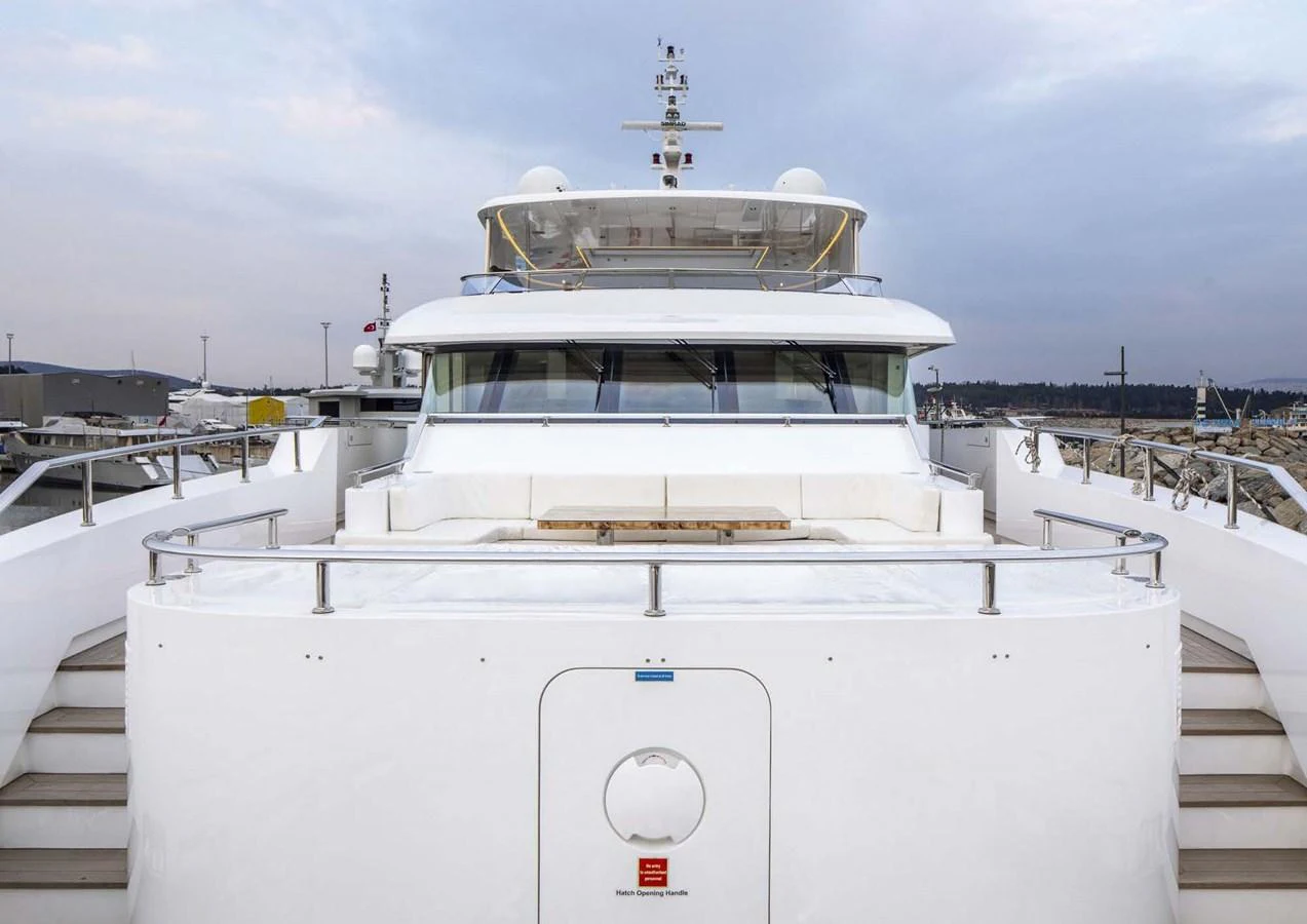 a white boat with a cross on it aboard DOMENIKA Yacht for Sale