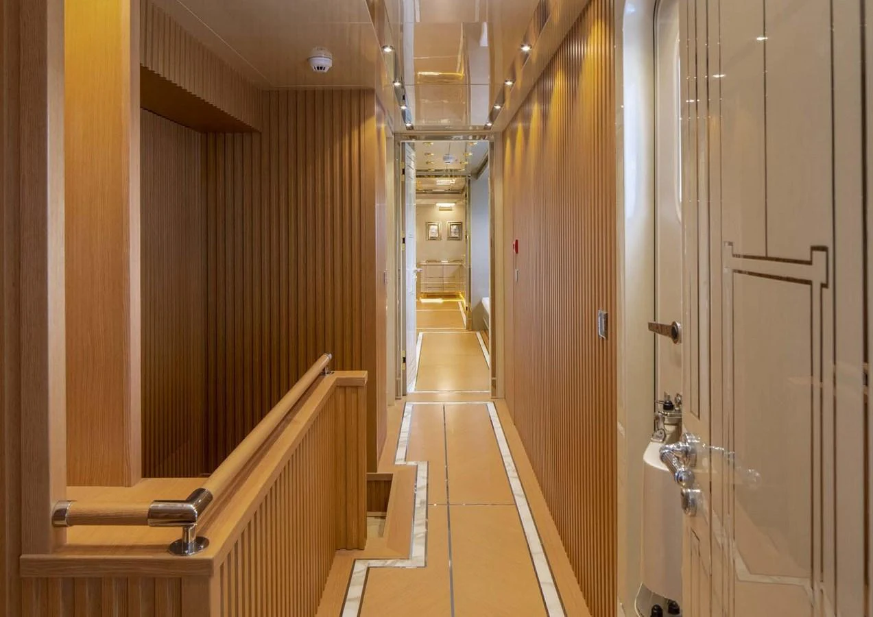 a hallway with doors aboard DOMENIKA Yacht for Sale