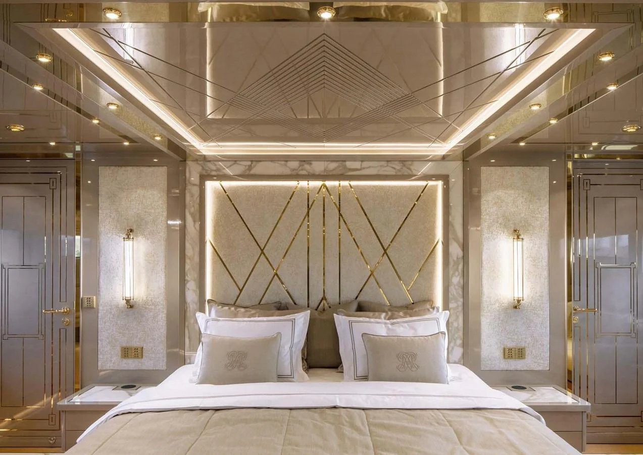 a bed with a white sheet and a white bed spread aboard DOMENIKA Yacht for Sale