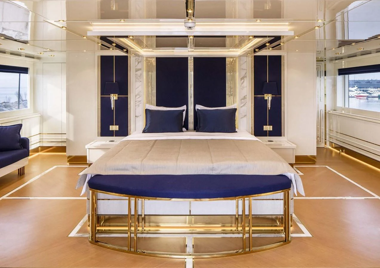 a large bed in a room aboard DOMENIKA Yacht for Sale