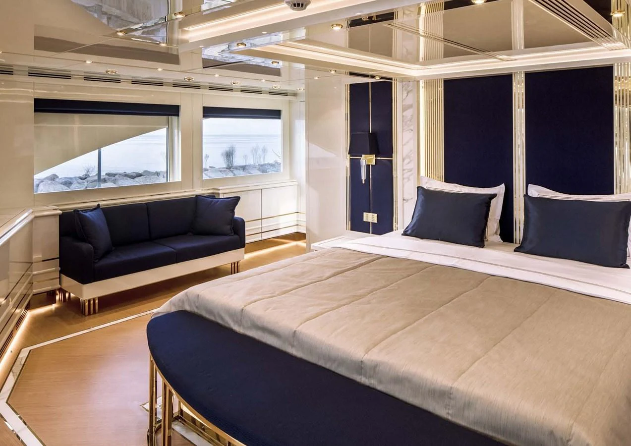 a large bed in a room aboard DOMENIKA Yacht for Sale