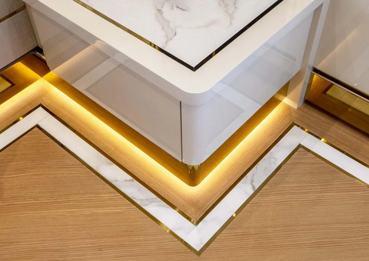 a wooden staircase with white railings aboard DOMENIKA Yacht for Sale