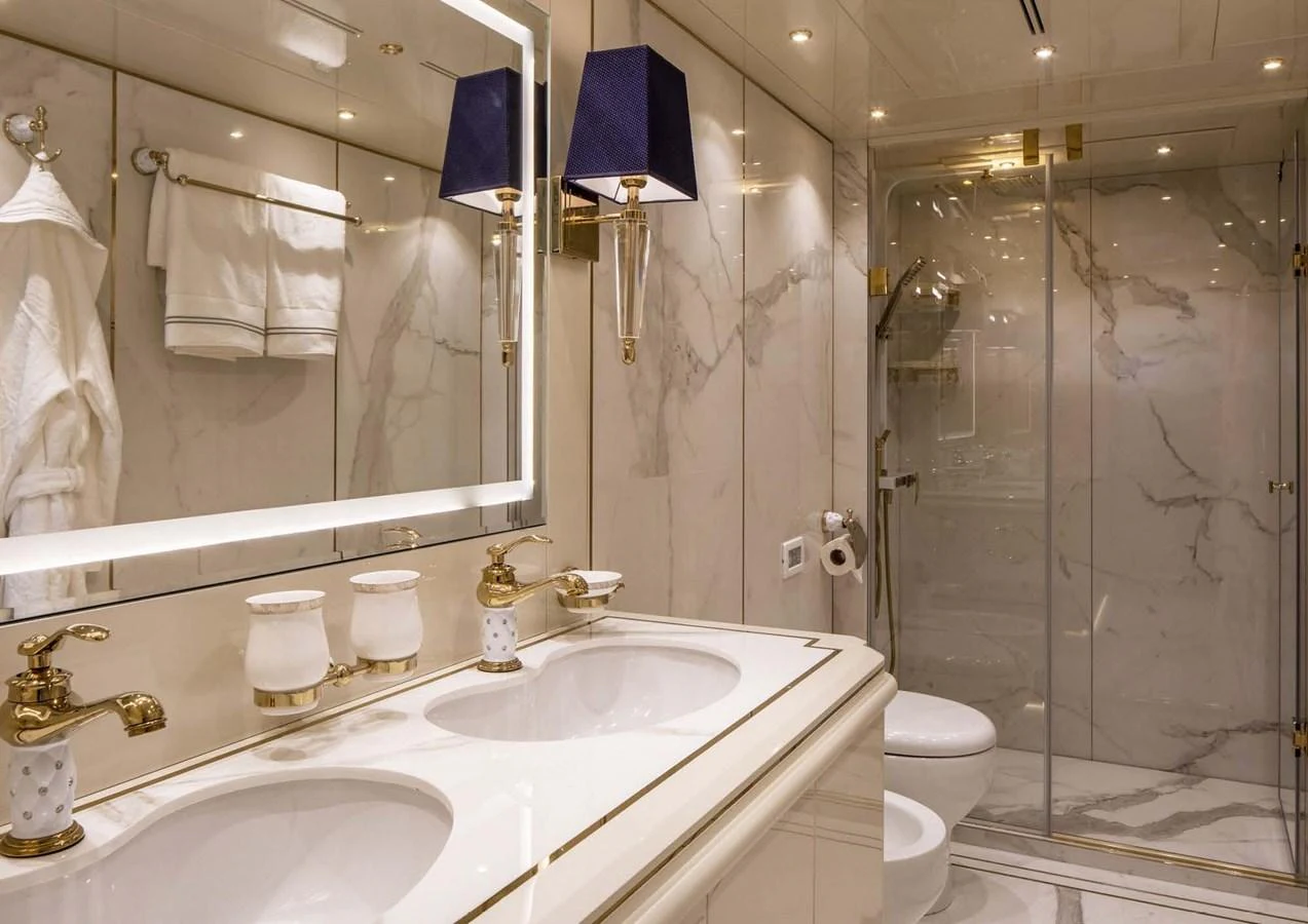 a bathroom with a shower and sink aboard DOMENIKA Yacht for Sale