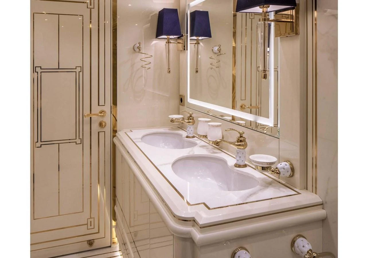 a bathroom with a large mirror aboard DOMENIKA Yacht for Sale