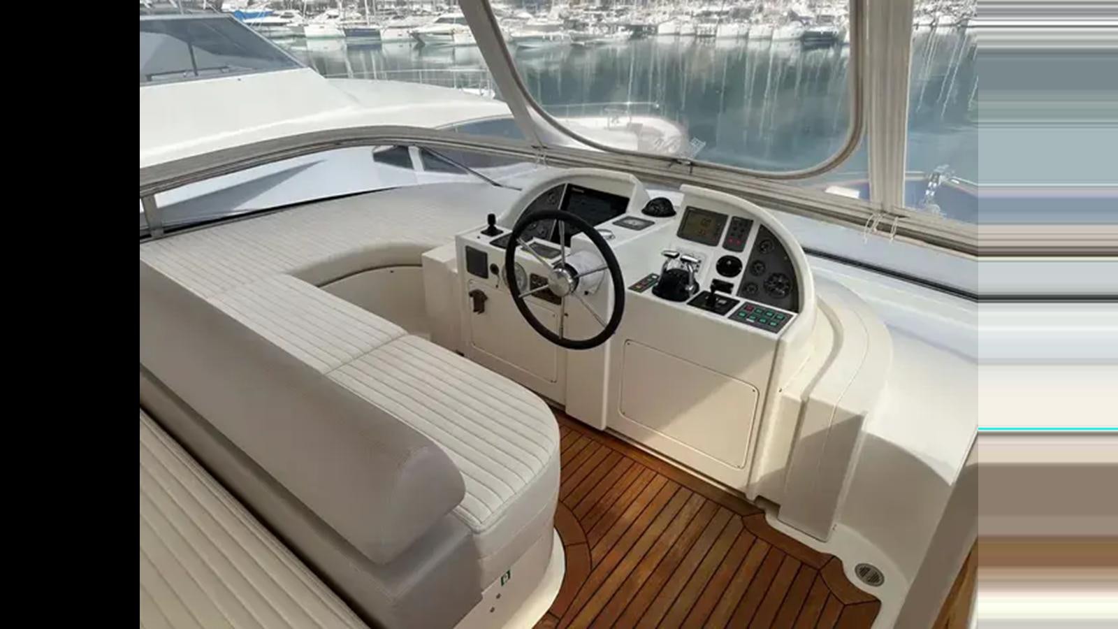 inside of a car aboard CHARISMA II Yacht for Sale