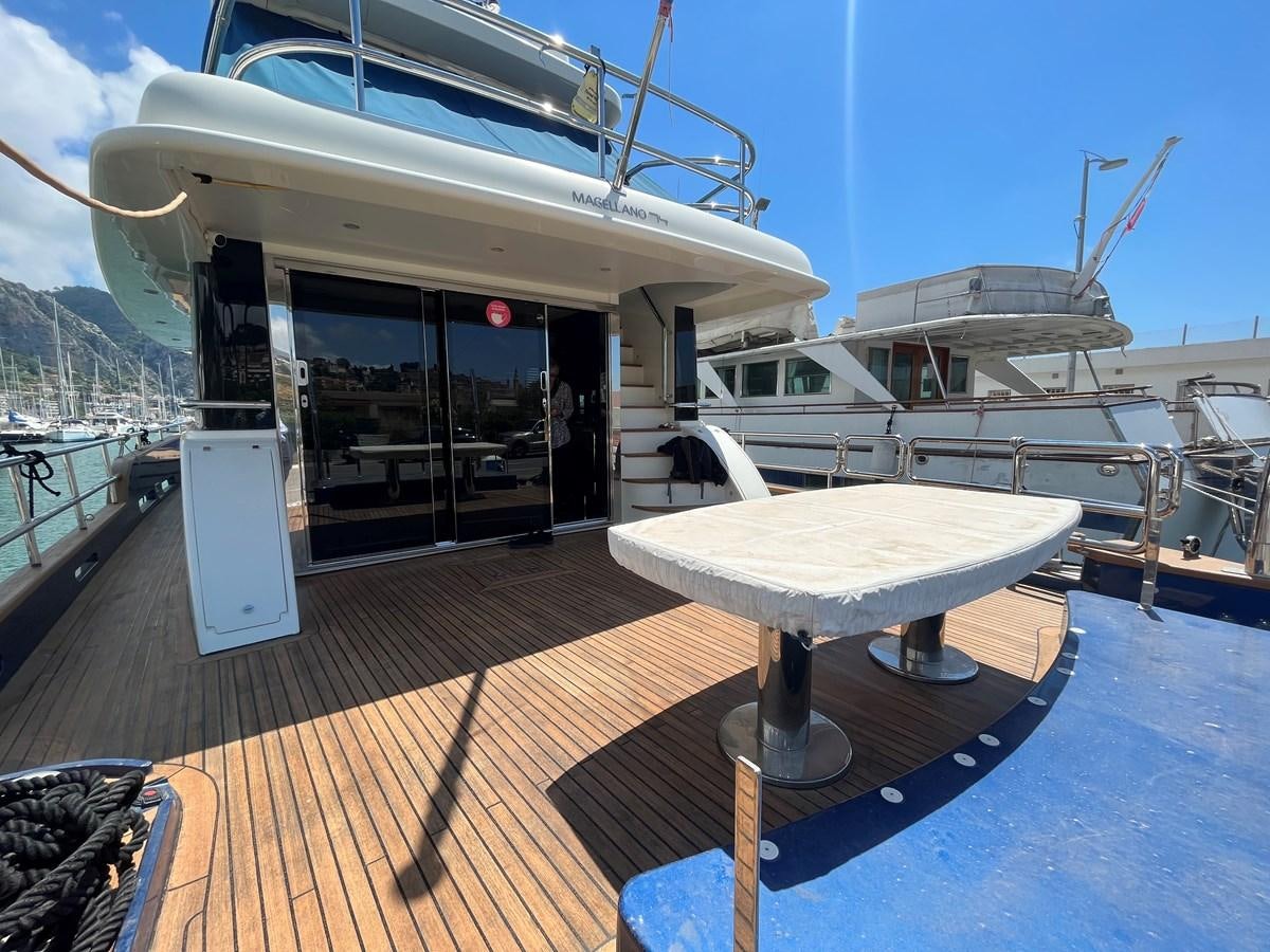 a boat on a dock aboard CHARISMA II Yacht for Sale