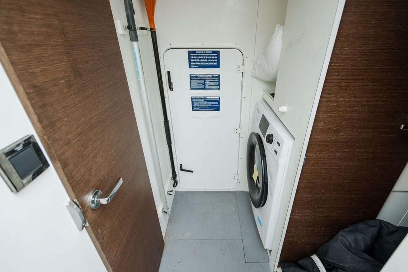 a door with a button on it aboard YACHTOOMA Yacht for Sale