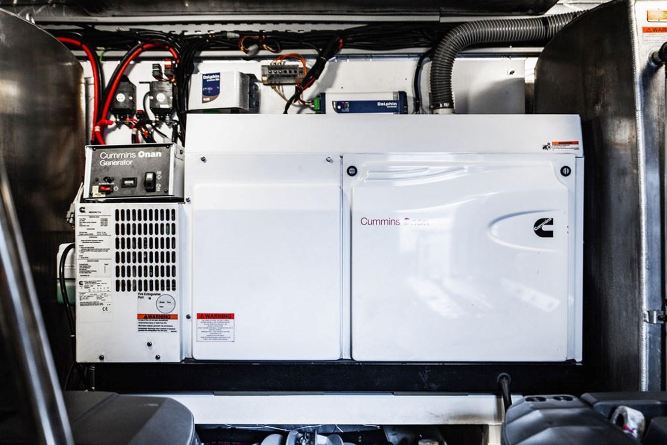 a machine with a piece of equipment aboard YACHTOOMA Yacht for Sale