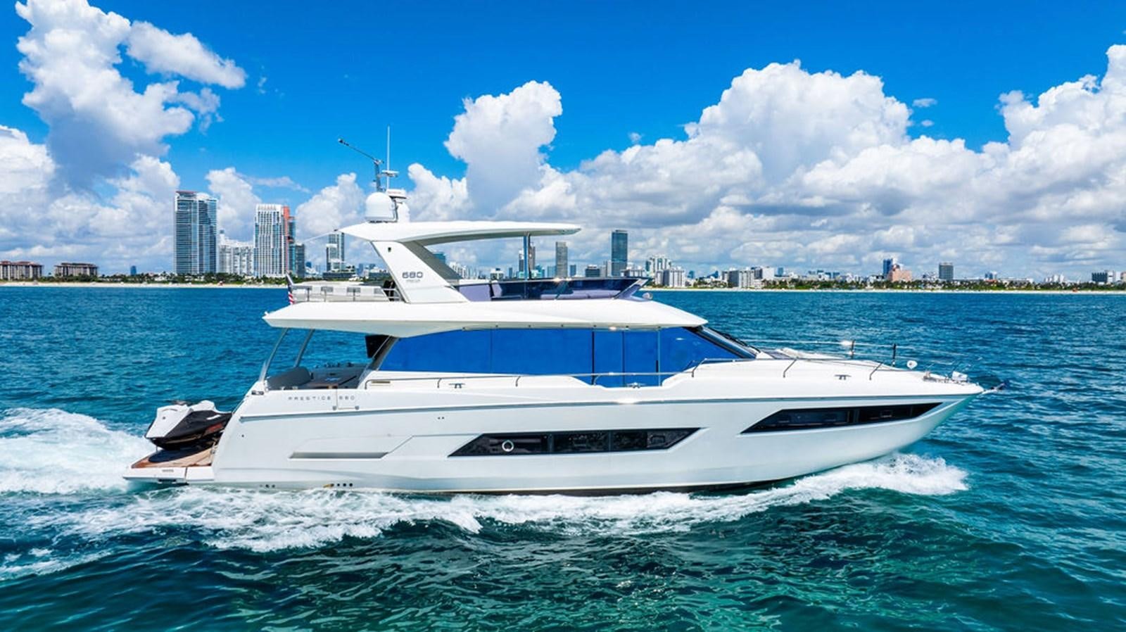 a white yacht on the water aboard YACHTOOMA Yacht for Sale