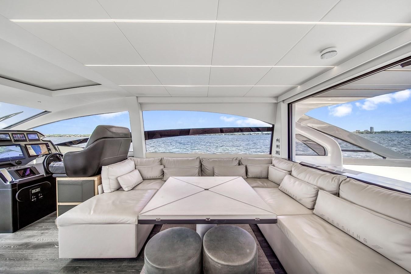a room with a couch and a table aboard SANS SOUCI VIII Yacht for Sale