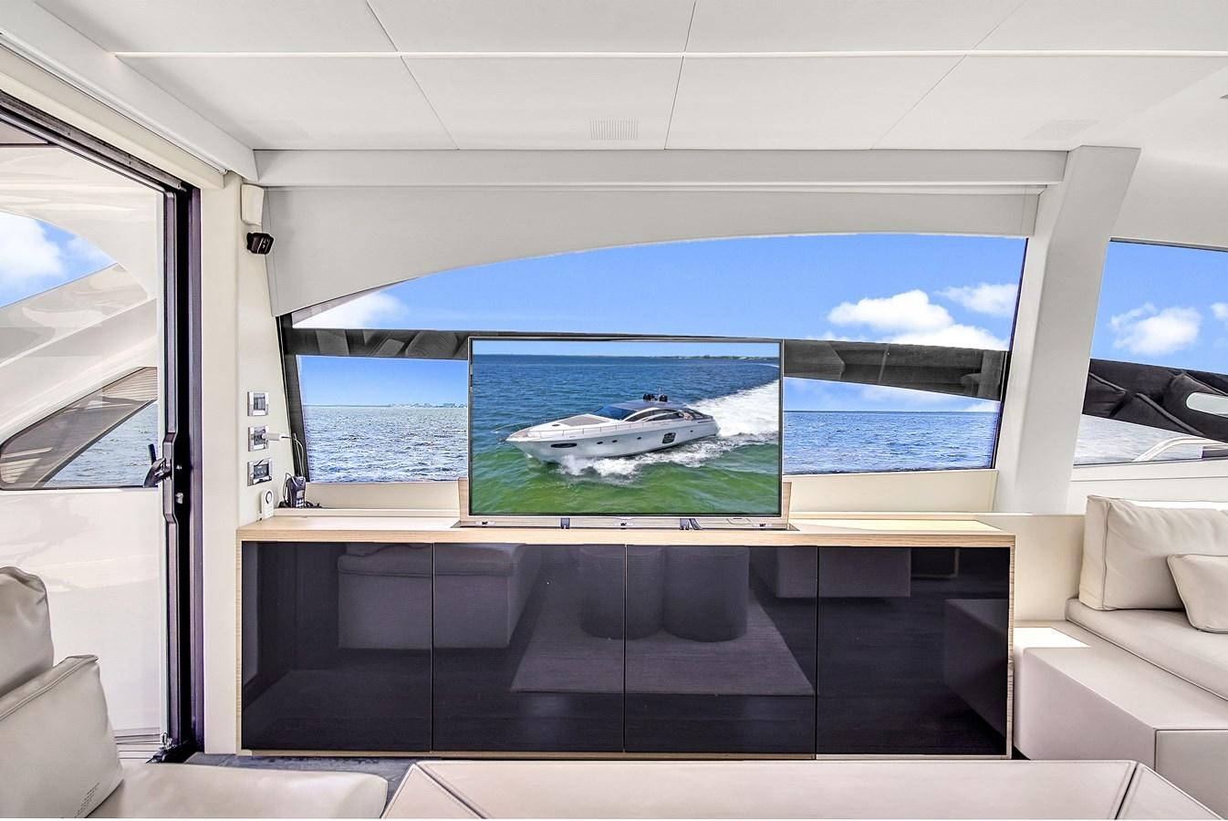 a room with a large window and a view of the ocean aboard SANS SOUCI VIII Yacht for Sale