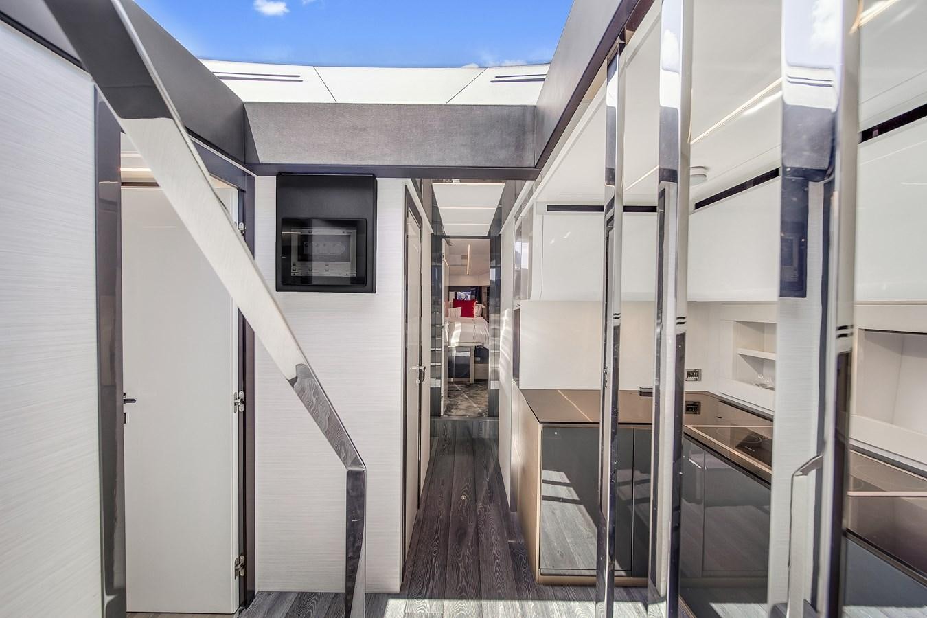 a hallway with several doors aboard SANS SOUCI VIII Yacht for Sale