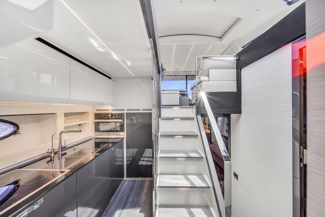 a kitchen with stainless steel appliances aboard SANS SOUCI VIII Yacht for Sale