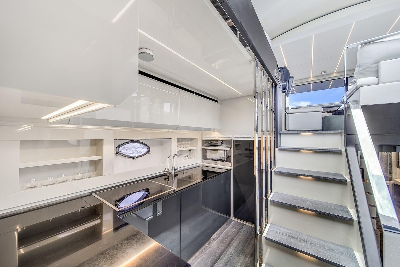 a kitchen with stainless steel appliances aboard SANS SOUCI VIII Yacht for Sale