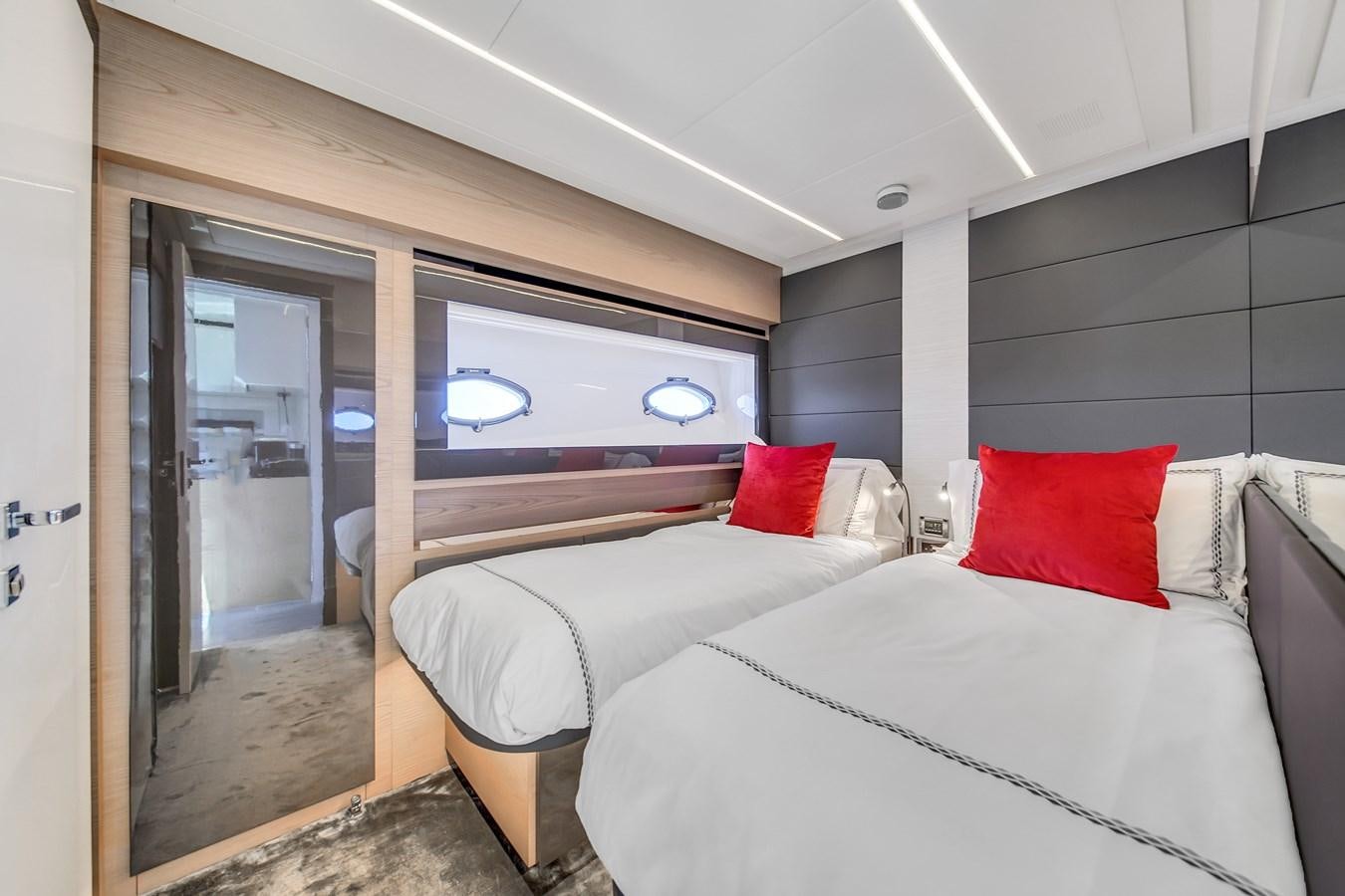 a room with two beds aboard SANS SOUCI VIII Yacht for Sale