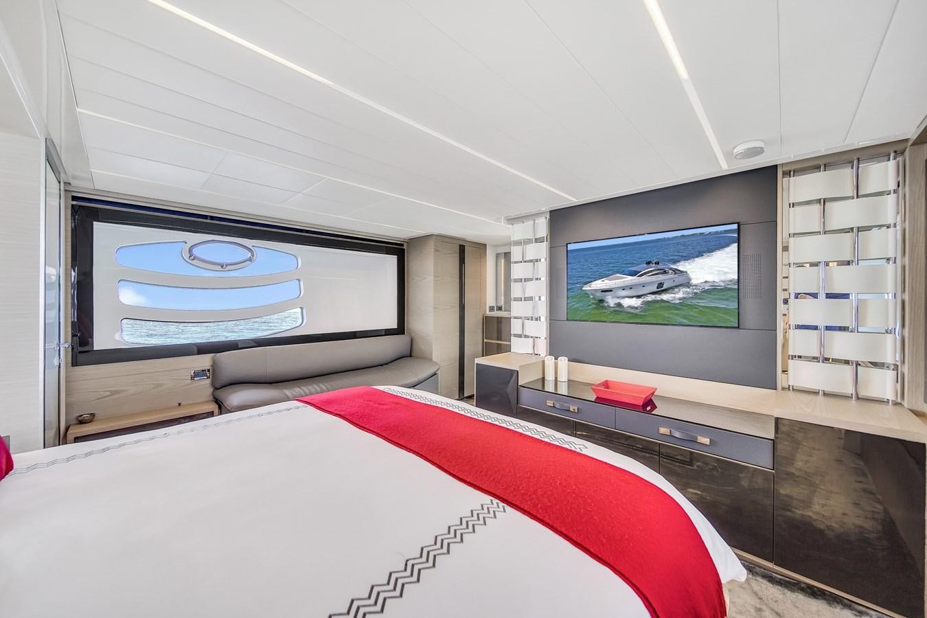 a room with a tv and a bed aboard SANS SOUCI VIII Yacht for Sale