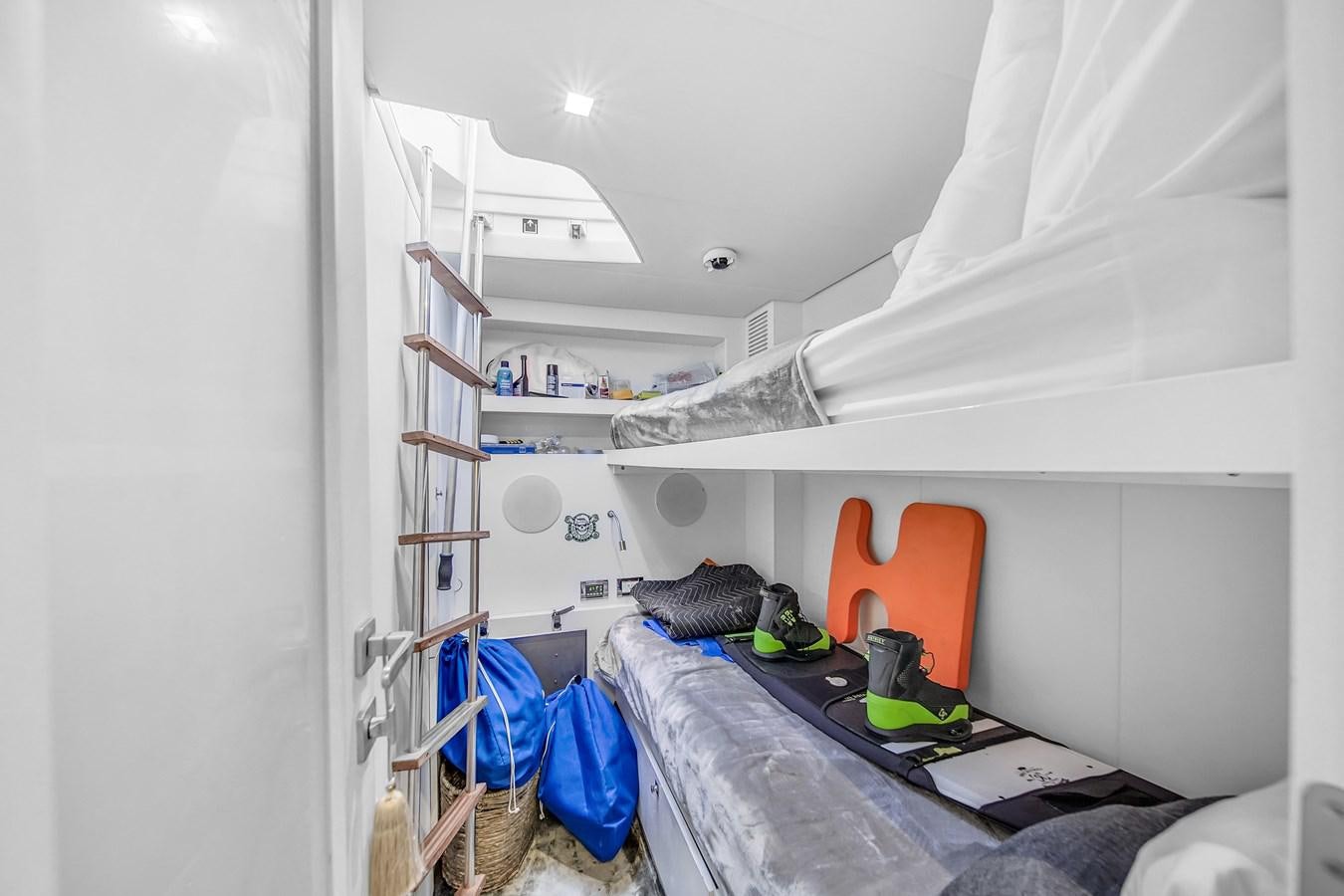 a room with a bed and a ladder aboard SANS SOUCI VIII Yacht for Sale