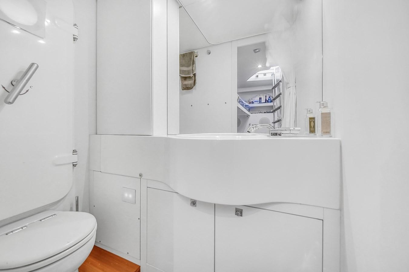a bathroom with a mirror aboard SANS SOUCI VIII Yacht for Sale