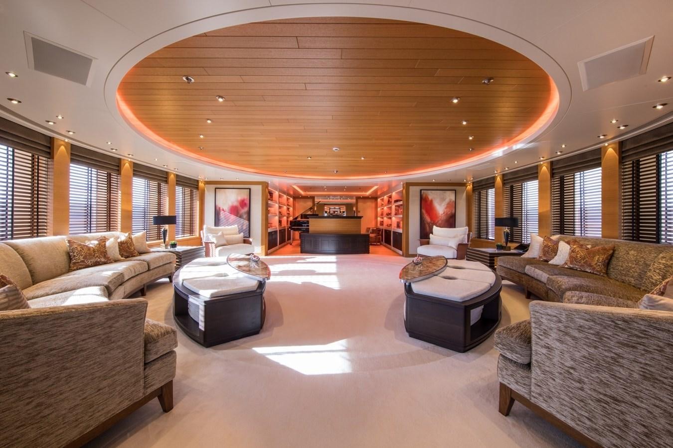 a large living room with a large ceiling aboard CAIPIRINHA Yacht for Sale