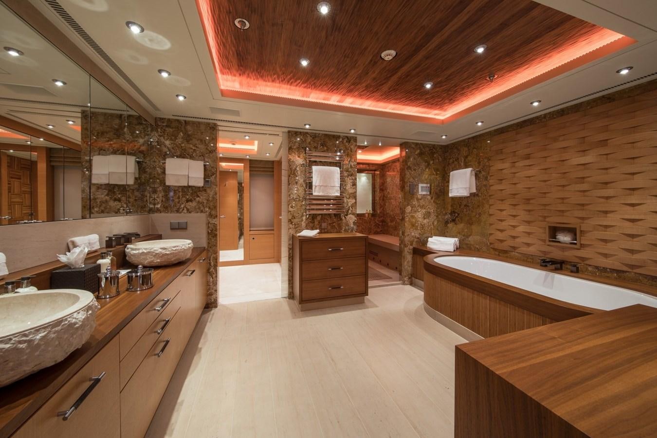 a large bathroom with a large tub aboard CAIPIRINHA Yacht for Sale